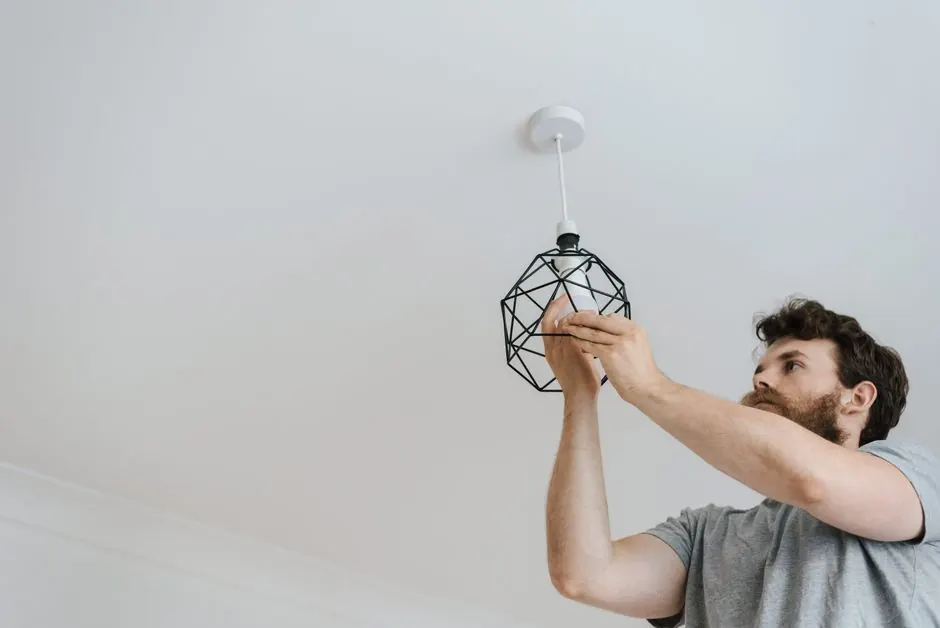 Experienced ceiling fan installation professionals at work