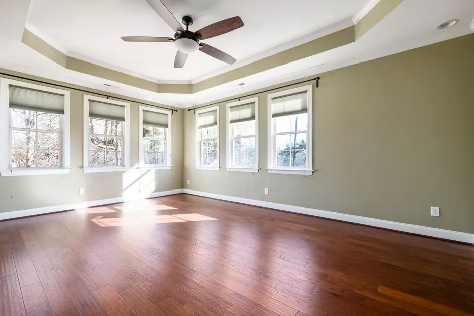 Experienced ceiling fan installation professionals at work